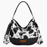 Slouch_Bag_Black_Cow_Print_Front